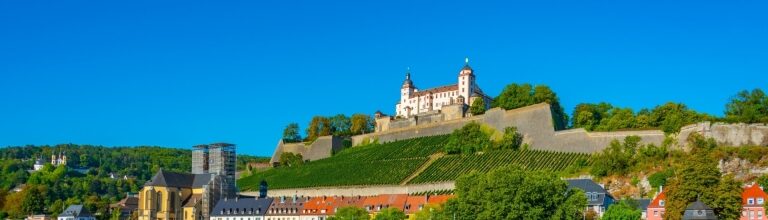 Scenic view of Würzburg’s Marienberg Fortress above the riverbank