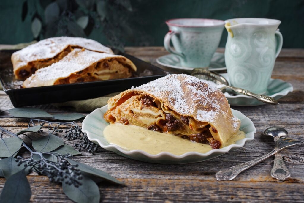 Freshly baked Apfelstrudel dusted with powdered sugar