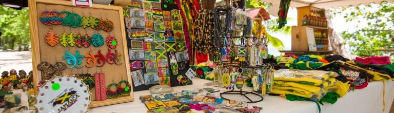 Table with colorful handcrafted Jamaica souvenirs and keepsakes