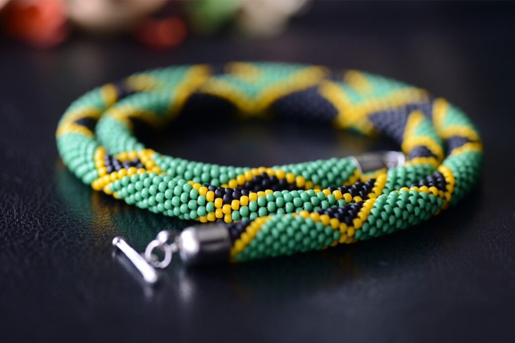 Beaded necklace in the colors of the Jamaican flag