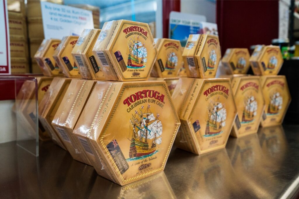 Packs of Tortuga Rum Cakes arranged on a store display for Jamaica souvenirs