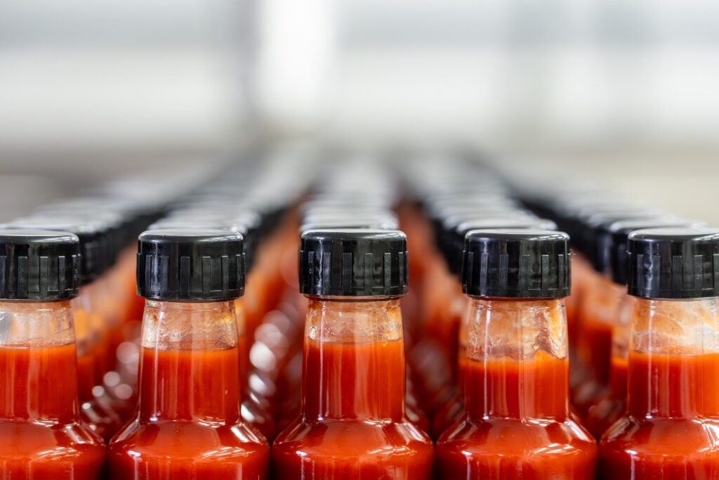 Close-up of artisanal hot sauce bottles