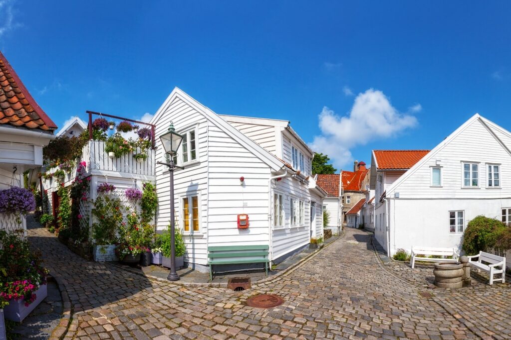 Picturesque view of white heritage houses in Old Stavanger, Norway in the summer
