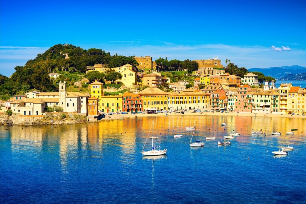 Sestri Levante landscape with historic buildings, coastline, and surrounding hills