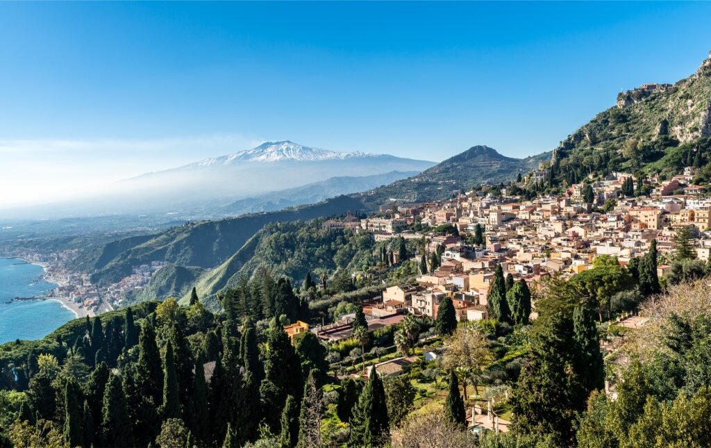Aerial view of Taormina, Sicily with Mount Etna in the background