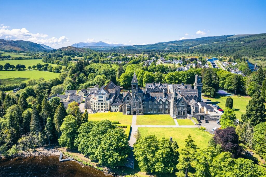 Aerial view of the Highland Club in Fort Augustus, Scotland surrounded by greenery