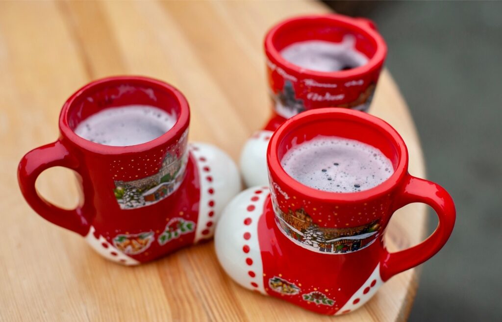 Mulled wine served in festive sock-style holiday mug