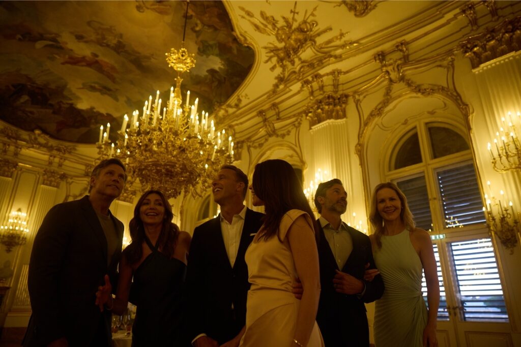 Interior view of Schönbrunn Palace with tourists