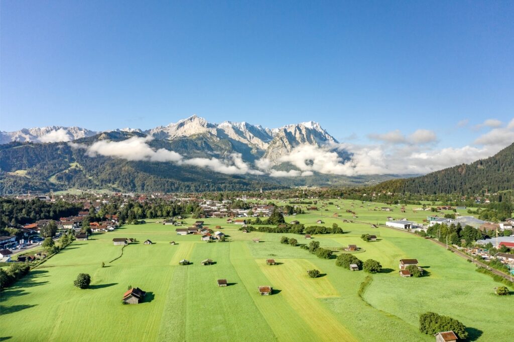 Aerial view of Garmisch-Partenkirchen village with Zugspitze mountain