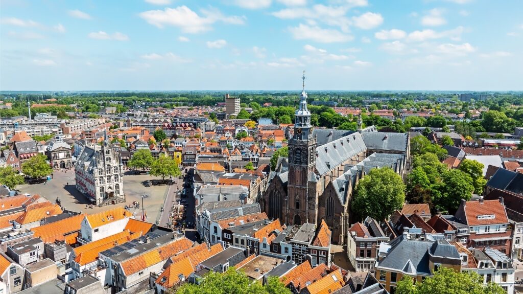 Aerial view of Gouda city center with rooftops and landmarks