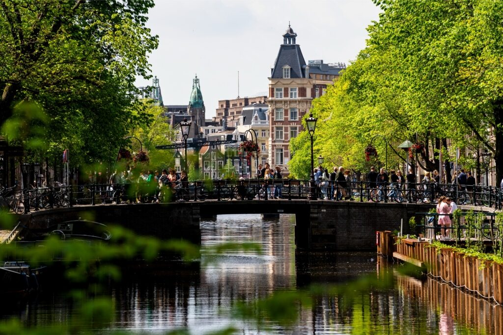Picturesque canal bridge scene in Amsterdam Netherlands