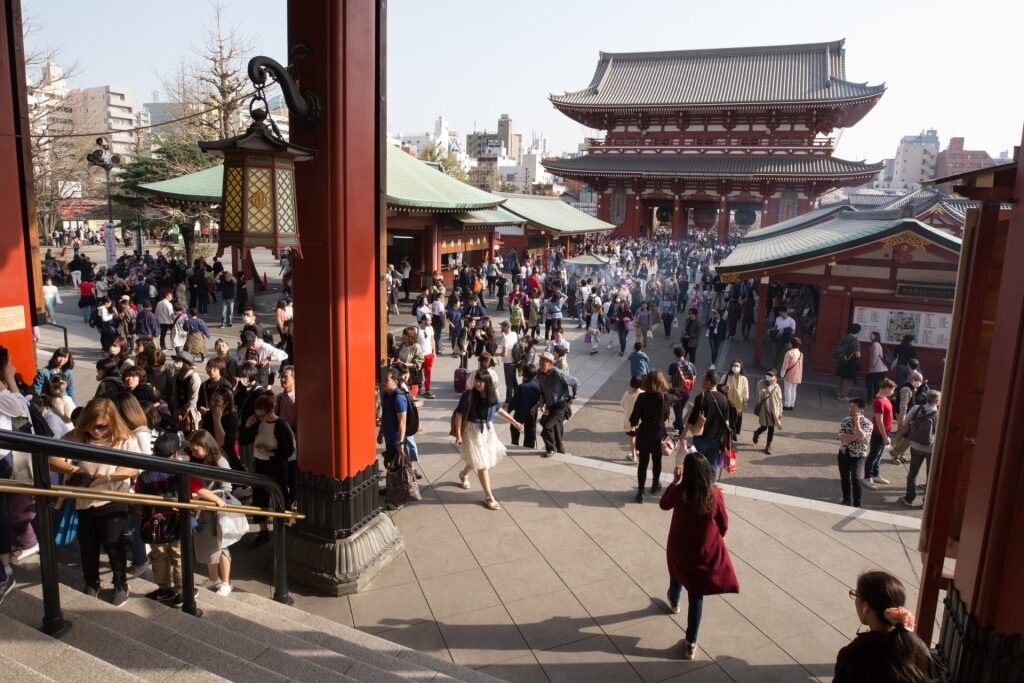 Visitors filling the temple grounds at iconic Senso-ji in Tokyo