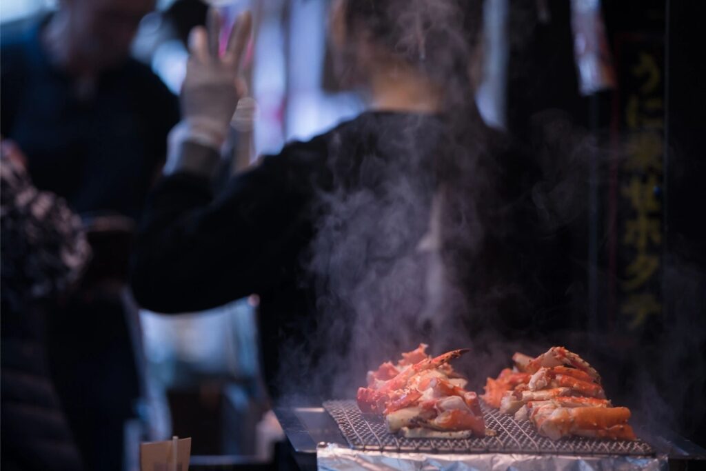 Fresh crab being cooked at Tsukiji Market in Tokyo