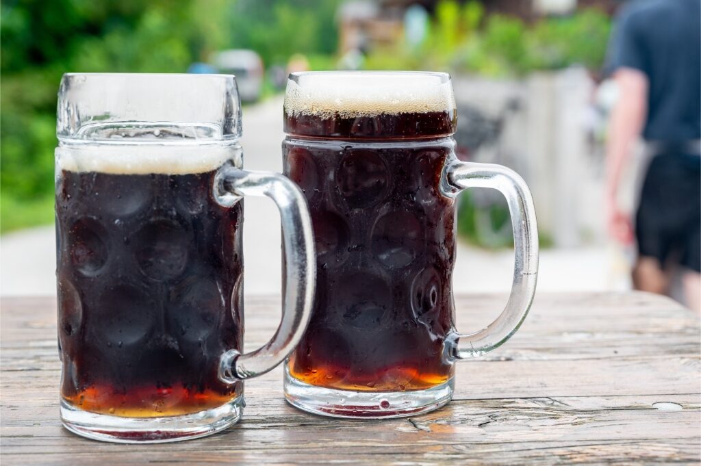 Two large glasses of Dunkel beer, traditional German dark lager