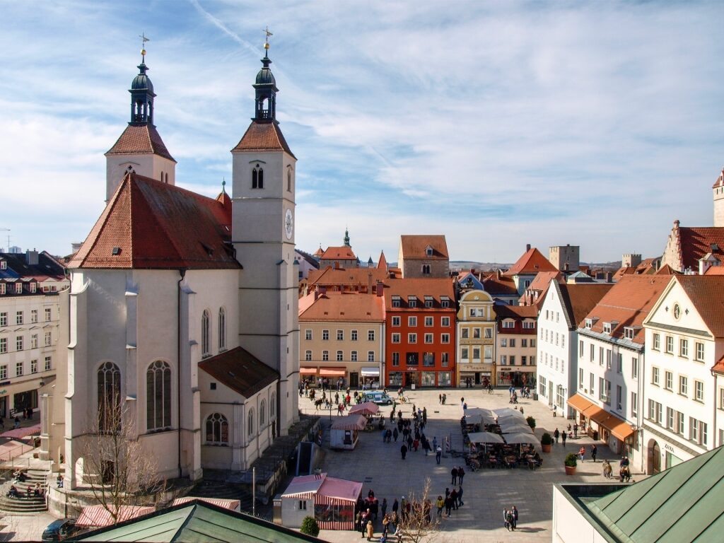 View of New Parish Square in Regensburg with colorful historic buildings