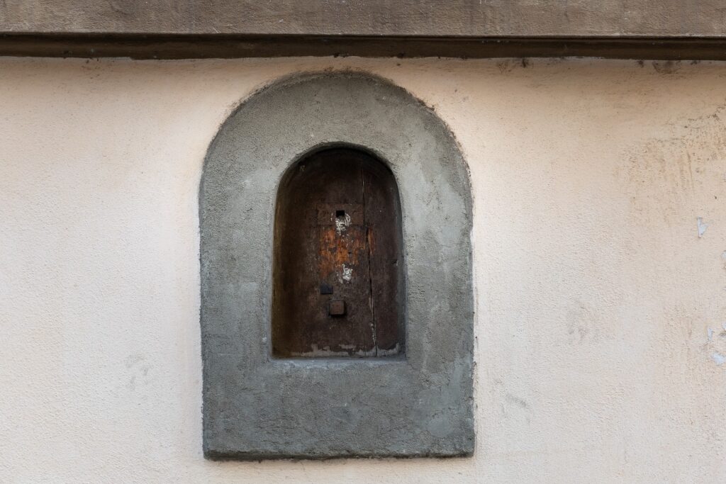 Historic Florence wine window used for serving wine, called buchetta del vino