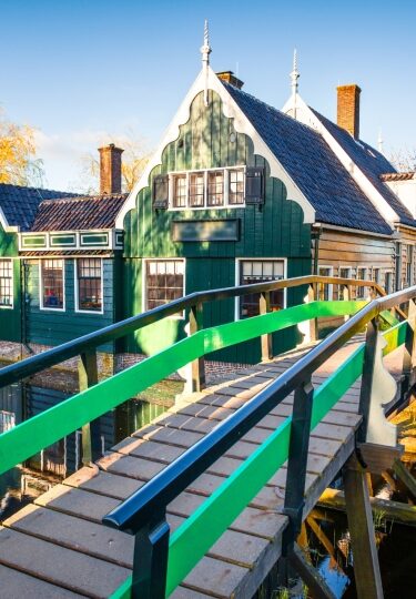 Scenic Zaanse Schans view with canal, bridge, and traditional houses