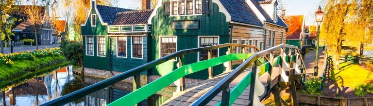 Scenic Zaanse Schans view with canal, bridge, and traditional houses