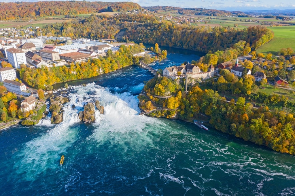 Aerial view over the Rhine Falls in autumn.