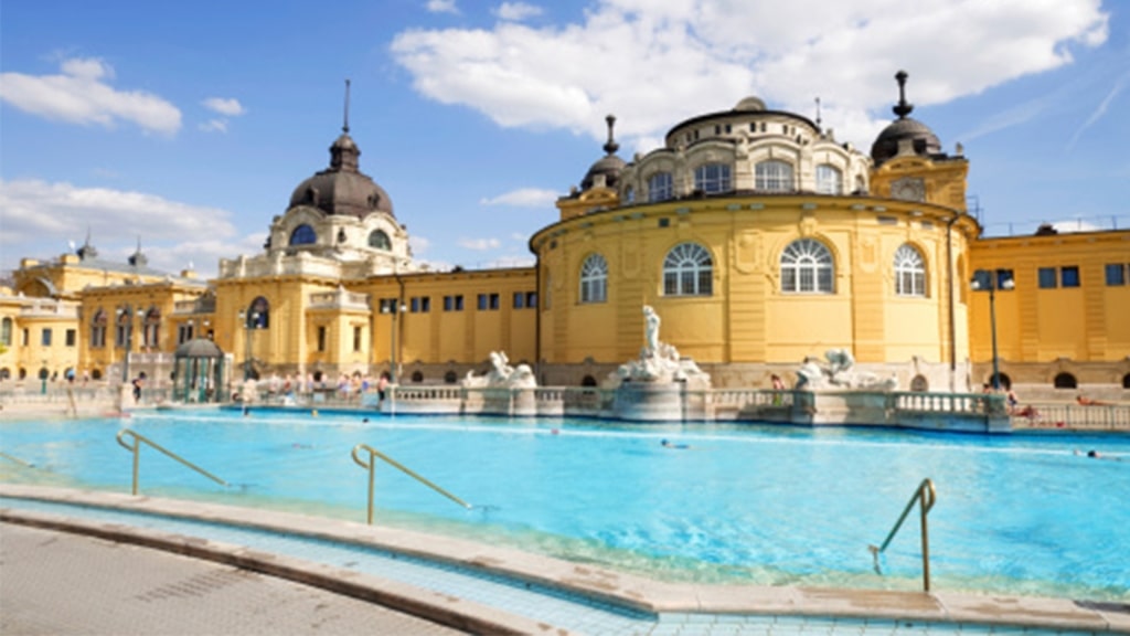 Outdoor thermal pools of a historic Budapest bathhouse.