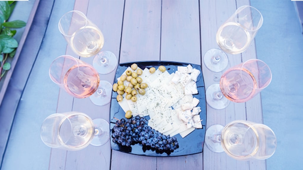 Wine tasting flight and appetizer spread.