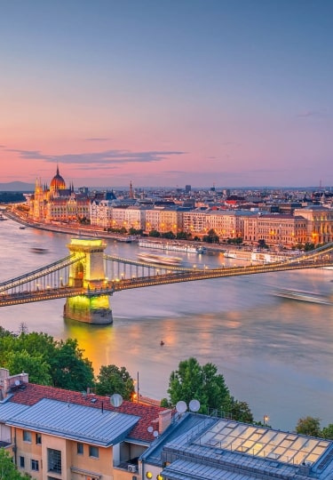Budapest, Hungary. Aerial cityscape image of Budapest panorama with Chain Bridge and parliament building during summer sunset.