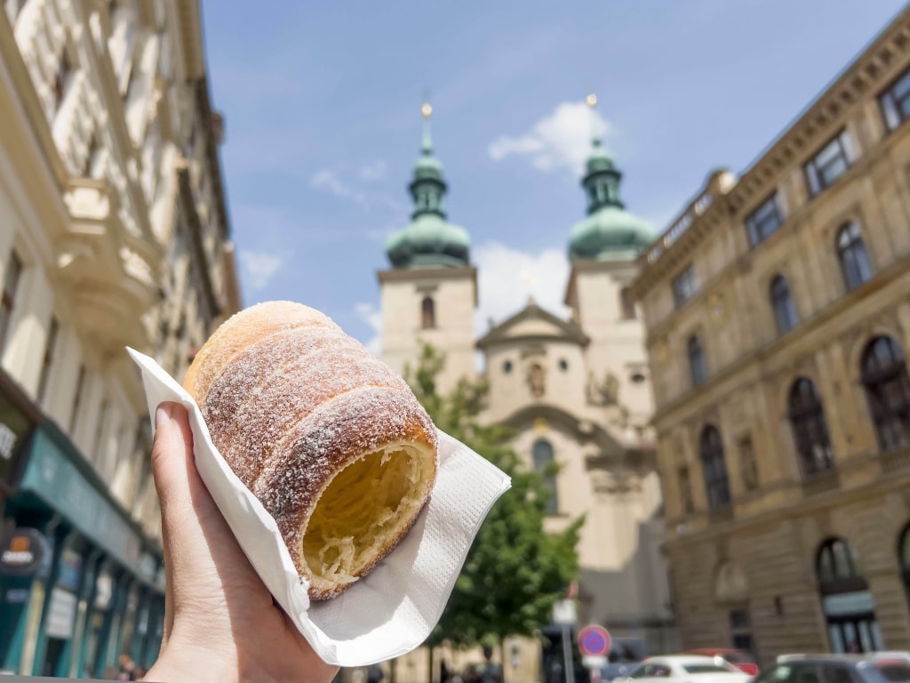 Trdelnik, unique cinnamon sugar pastry local sweet or dessert in Prague, Czech Republic.
