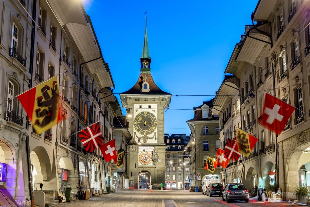 Bern's Old City with Zytglogge tower by night blue hour in Switzerland.
