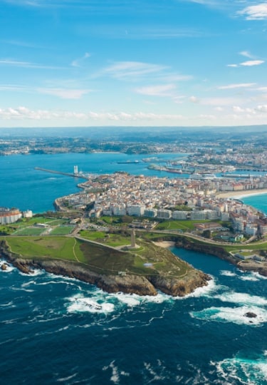 A breathtaking aerial perspective of the A Coruña peninsula, nestled within the Galicia region of Spain.