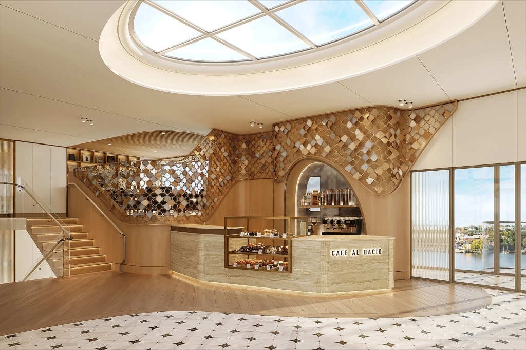 Amazing interior of Café al Bacio, showcasing the artisanal pastry station and natural light from the overhead skylight.
