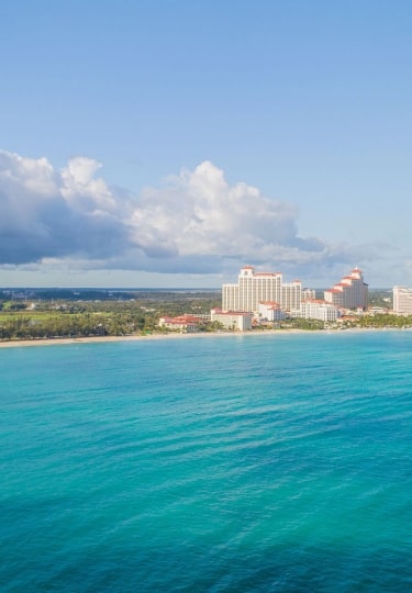 A stunning aerial perspective view of Nassau's shimmering tropical turquoise waters.