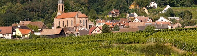 Husseren-les-Chateaux village along the famous wine route in Alsace, France