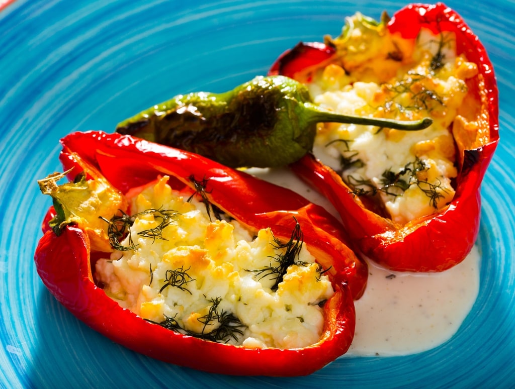 Beautifully served red pepper stuffed with brynza (salted goat cheese) - traditional Bulgarian dish