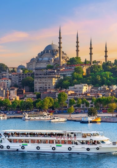 Scenic of Istanbul city and touristic sightseeing ships in Turkey