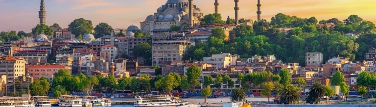 Scenic of Istanbul city and touristic sightseeing ships in Turkey