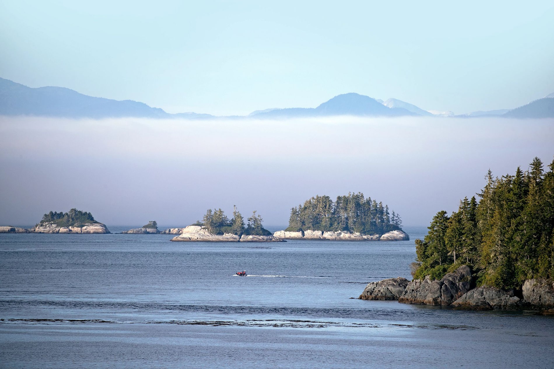 Navigating through mist-draped fjords and pine-covered islets, Alaska’s Inside Passage reveals serene, untouched coastal landscapes at every turn