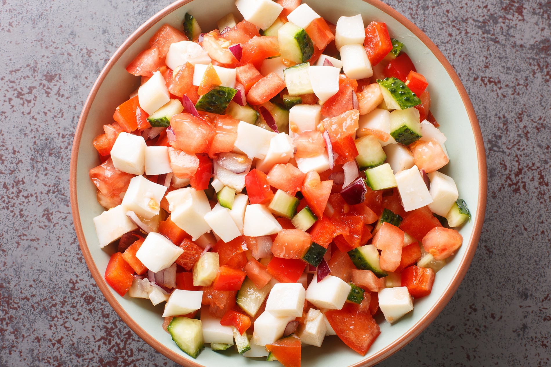Diced tender conch tossed with crisp peppers, tomatoes, and citrus captures the bright, refreshing flavor profile of authentic Bahamian street food