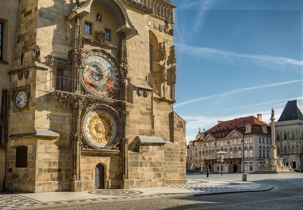 Prague’s famed Astronomical Clock graces the vibrant, sun-drenched Old Town Square.