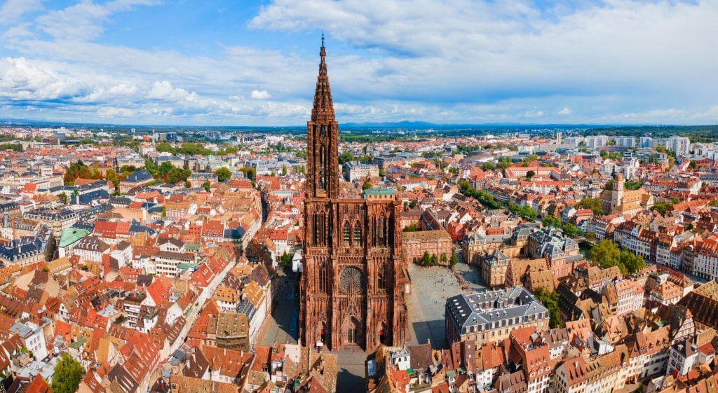 Strasbourg Notre Dame Cathedral towers high above the historic old town’s red rooftops.