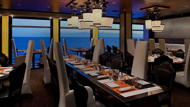 https://www.celebritycruises.com/is/image/content/dam/celebrity/eat-and-drink/5005-tables-eat-and-drink-qsine.jpg?$16x9-med$