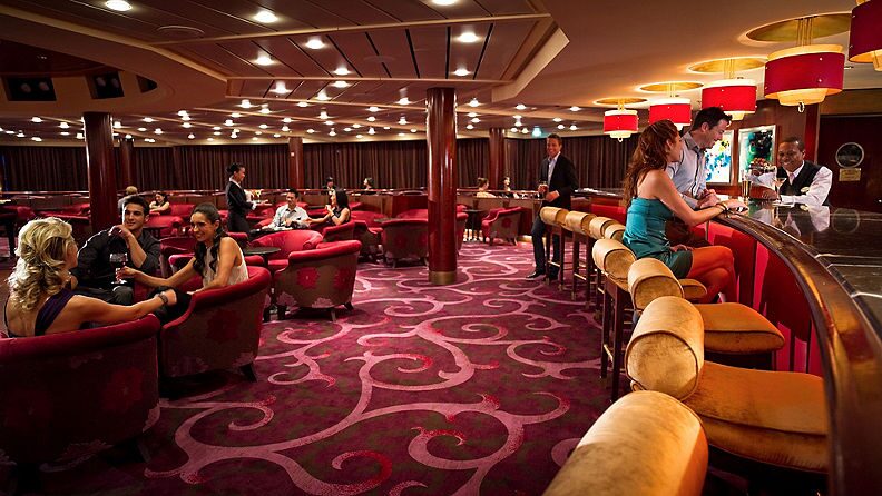 https://www.celebritycruises.com/is/image/content/dam/celebrity/eat-and-drink/6768-bar-coctails-eat-and-drink-passport-bar.jpg?$16x9-med$