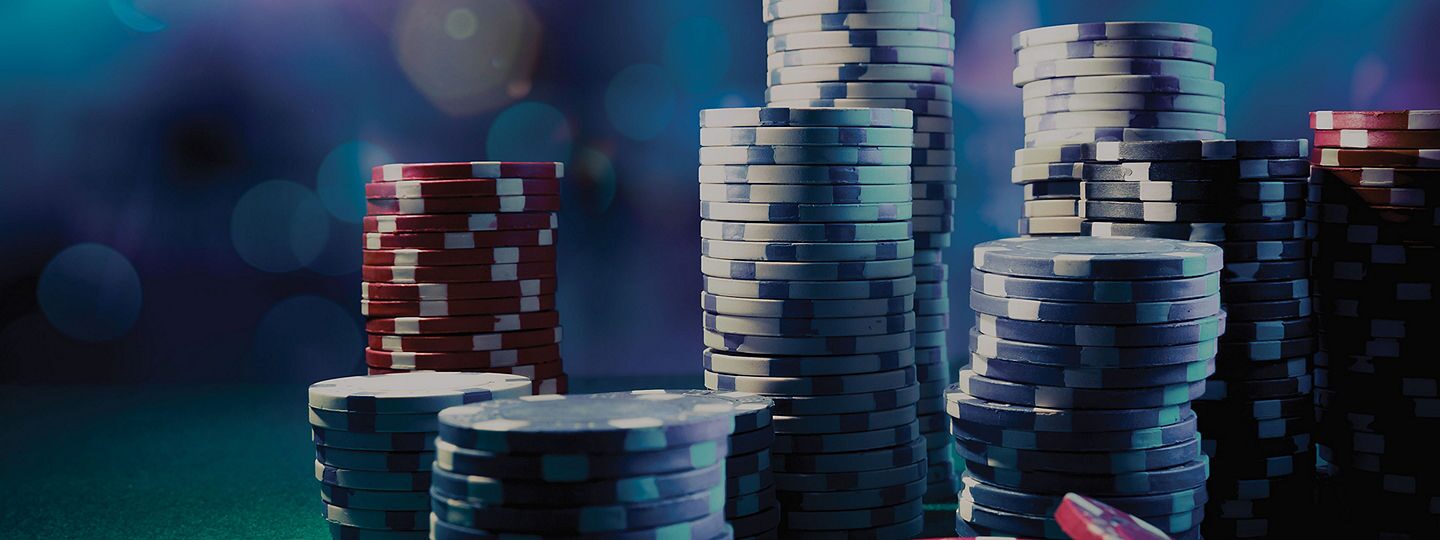 https://www.celebritycruises.com/is/image/content/dam/celebrity/new-images/onboard/casino-chips-80-opacity.jpg?$8x3-large$