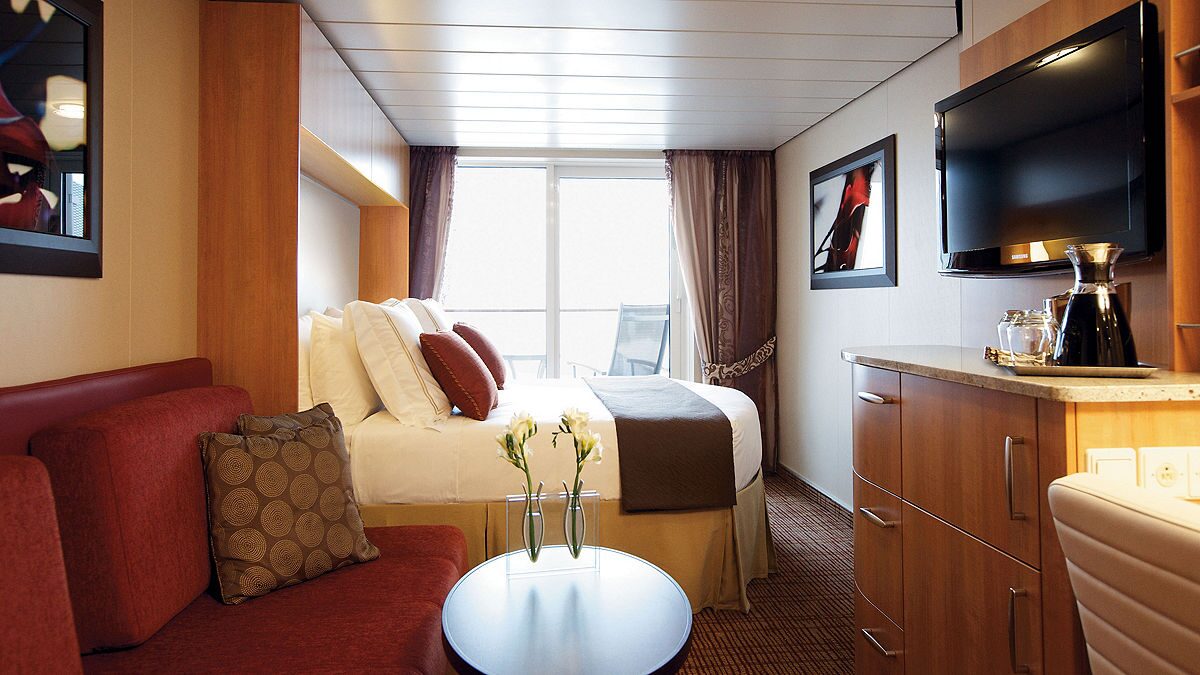 https://www.celebritycruises.com/is/image/content/dam/celebrity/staterooms/AquaClass-stateroom.jpg?$16x9-large$